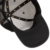 Black cap with mesh back and decorative elements on a white background